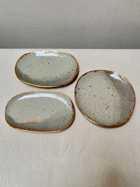 trinket dish w/gold luster - transparent